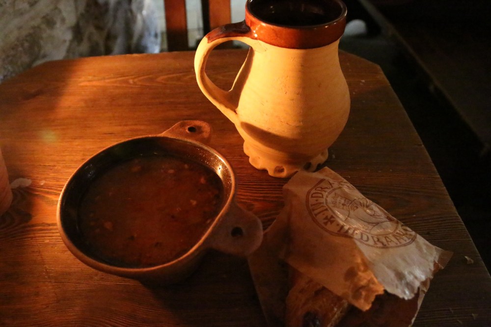 Elk soup, fresh bread, and a flagon of dark ale